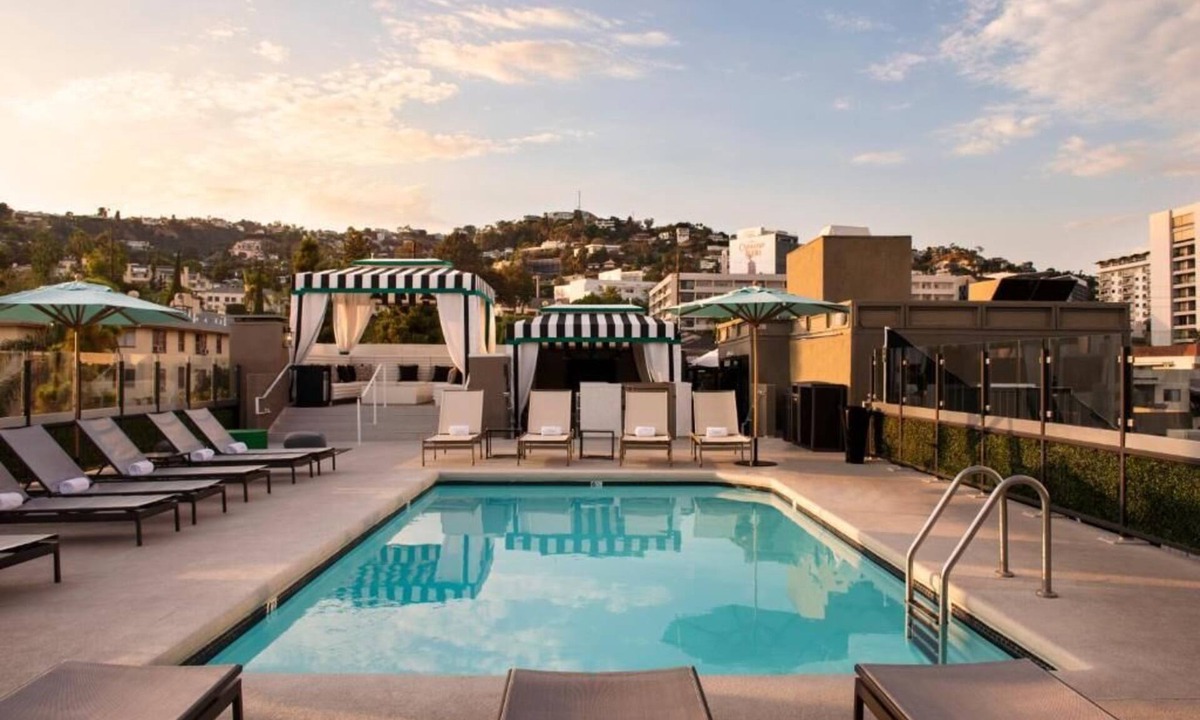 Norma Triangle Hotel | A Sophisticated Suite! Four Units with Furnished Living, Rooftop Pool, Balcony!