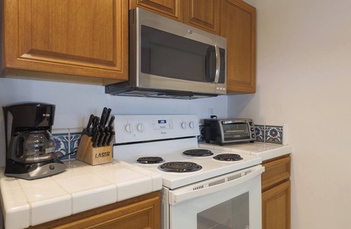 Avalon Condo | 2BR townhome Villa with golf cart and Ocean Views from Every Room!
