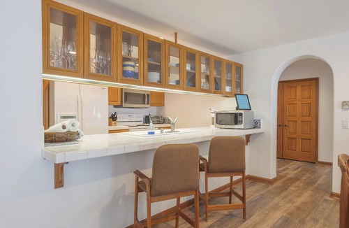 Avalon Condo | 2BR townhome Villa with golf cart and Ocean Views from Every Room!
