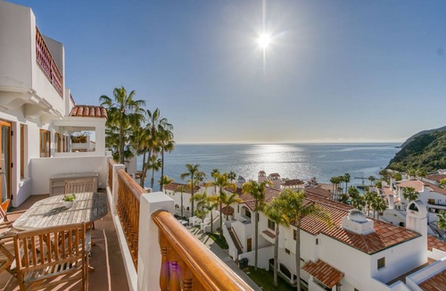 Avalon Condo | 2BR townhome Villa with golf cart and Ocean Views from Every Room!