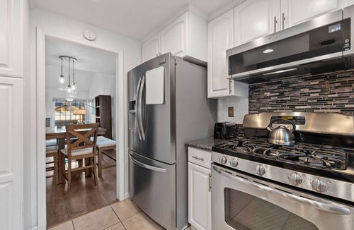 Bay Terraces Apartment | 4BR Oasis with Spa in Bay Terraces