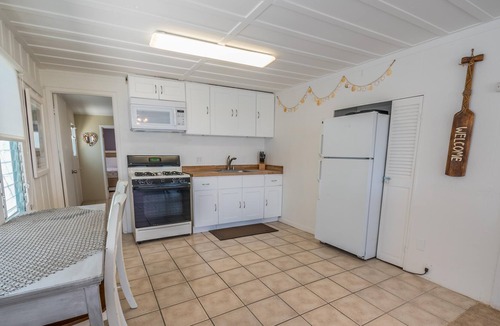 Balboa Peninsula House | Affordable Vintage Beachfront Vacation Cottage (left side) | Super Central - No Car Needed!