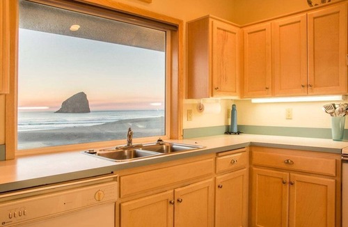 Kiwanda Shores House | At Last, direct beach access, wall of windows.