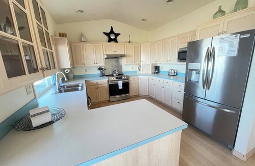 Kiwanda Shores House | At Last, direct beach access, wall of windows.