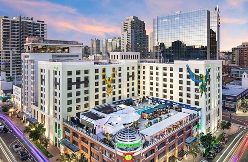 East Village Hotel | Authentic Beach Experience Room w/Lively Pool Bar, Onsite Parking Available
