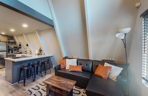 West Village Cabin | Beautiful A-frame home with spacious deck, firepit, loft, & nearby activities