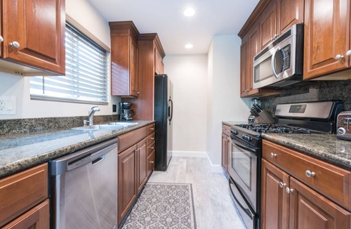 Santa Ana Heights House | Beautifully Remodeled Upstairs Beach House w/Rooftop Deck & Ocean View!