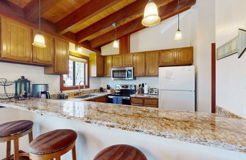 Lake Forest Condo | Lovely tree-view condo with deck, grill, & fireplace - near Tahoe City & lake