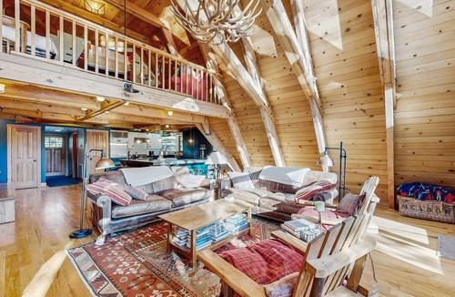 Serene Lakes House | Luxury lakefront home with private hot tub, on-site dock, fireplace & HOA beach