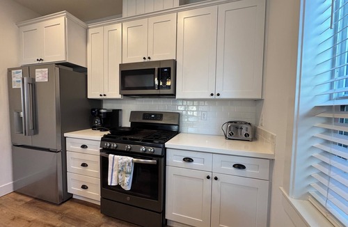 Olivia Beach House | Luxury Olivia Beach Retreat - Hot Tub, Game Room & Pet Friendly