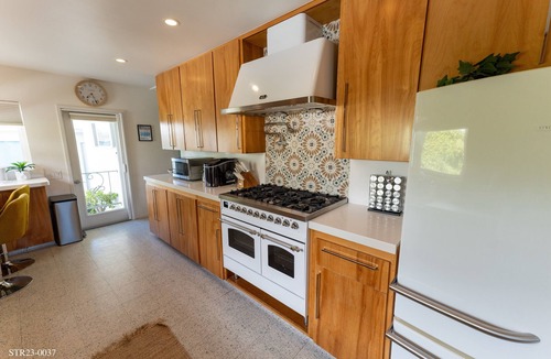 Lantern District House | Mid-century modern home with Epic Coastline Views! STR23-0037