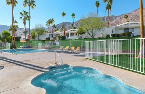 Canyon View Estates Condo | Pretty in Pink! Midcentury! One Level! Private Patio! 2 King Beds! Pool! Spa!
