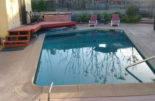 College East House | Relax at the Pool on a Budget!