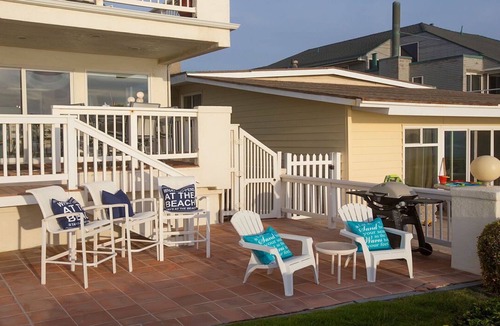 Imperial Beach Condo | Relax on the deck patio or beach and watch the dolphins frolicking in the waves