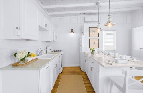 West Newport House | Second-story beach cottage with a furnished deck, AC, W/D, & garage parking