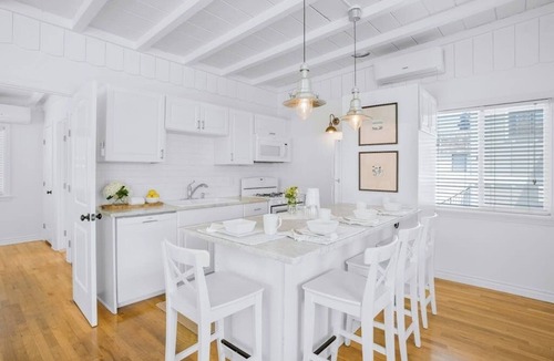 West Newport House | Second-story beach cottage with a furnished deck, AC, W/D, & garage parking
