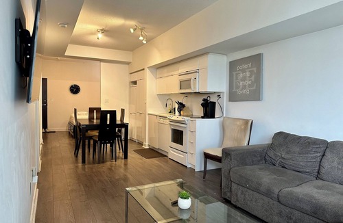 Bathurst Quay Apartment | Spacious 1 bedroom + den w/parking