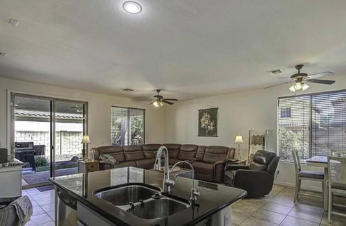 Anthem at Merrill Ranch House | Spacious 4-bedroom house in tranquil Florence with AC and gym