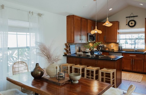 Crown Point House | Spacious, sunlit townhouse with beach gear, dreamy beds, and walkable access to PB’s best spots.