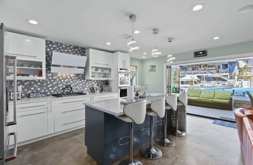 Sunset Beach House | Waterfront Luxury w/Hot Tub & Free Duffy Boat