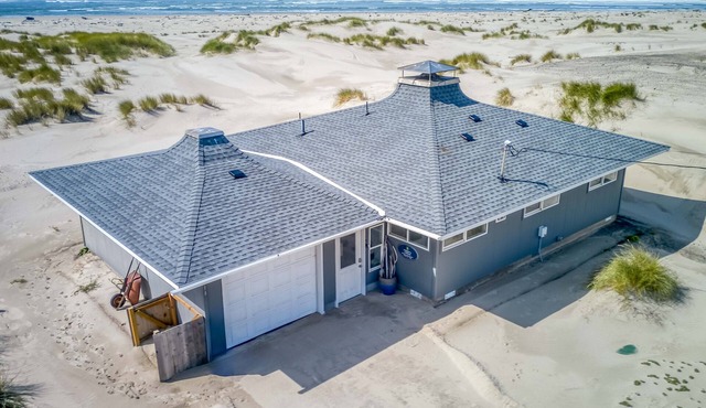 Bright, Open, Updated Single-Level Oceanfront Home Right on Beach with Game Room
