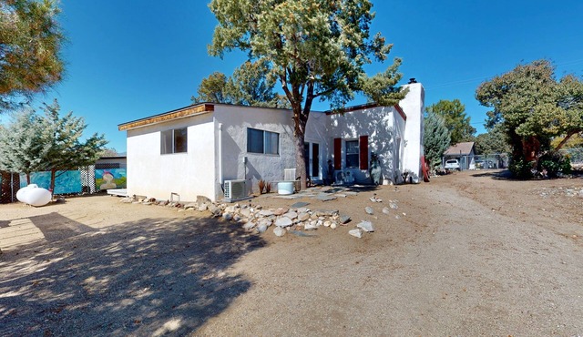 Cozy home with picturesque views of the mountains, a fireplace, and internet