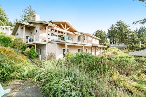 Dog-friendly ocean-view home near the beach with large deck grill & Ping-Pong