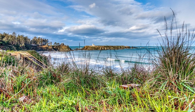 Dog-friendly, oceanfront home with patio plus lighthouse & ocean views