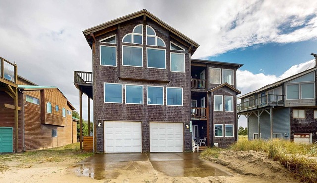 Gorgeous waterfront home with ocean views a furnished deck and beach access