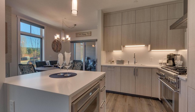 Luxurious 1183 sqft. 2 bed, 2 bath home seconds from the beach