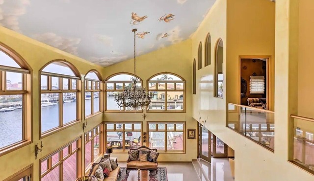 Luxurious 4-bed, 4-bath Oxnard rental: beach, hot tub, fire pit, stunning views.