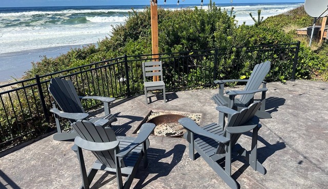 Luxury beachfront property with amazing views, hot tub and steps to the beach.