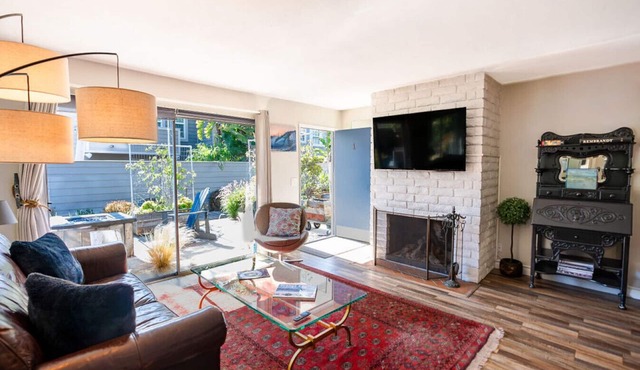 Newly remodeled, uniquely styled property surrounded by botanical-like garden setting.