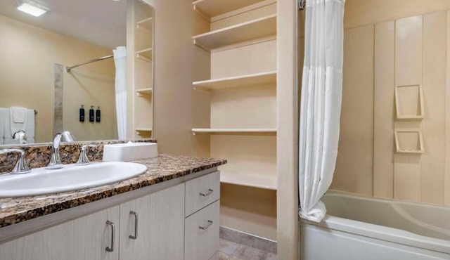 Palm Canyon Resort with fitness room, pools, kitchenette and spa!