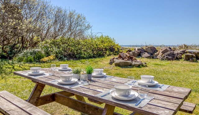 Relaxed, Secluded Oceanfront Cottage has Large Yard and Access to Miles of Beach